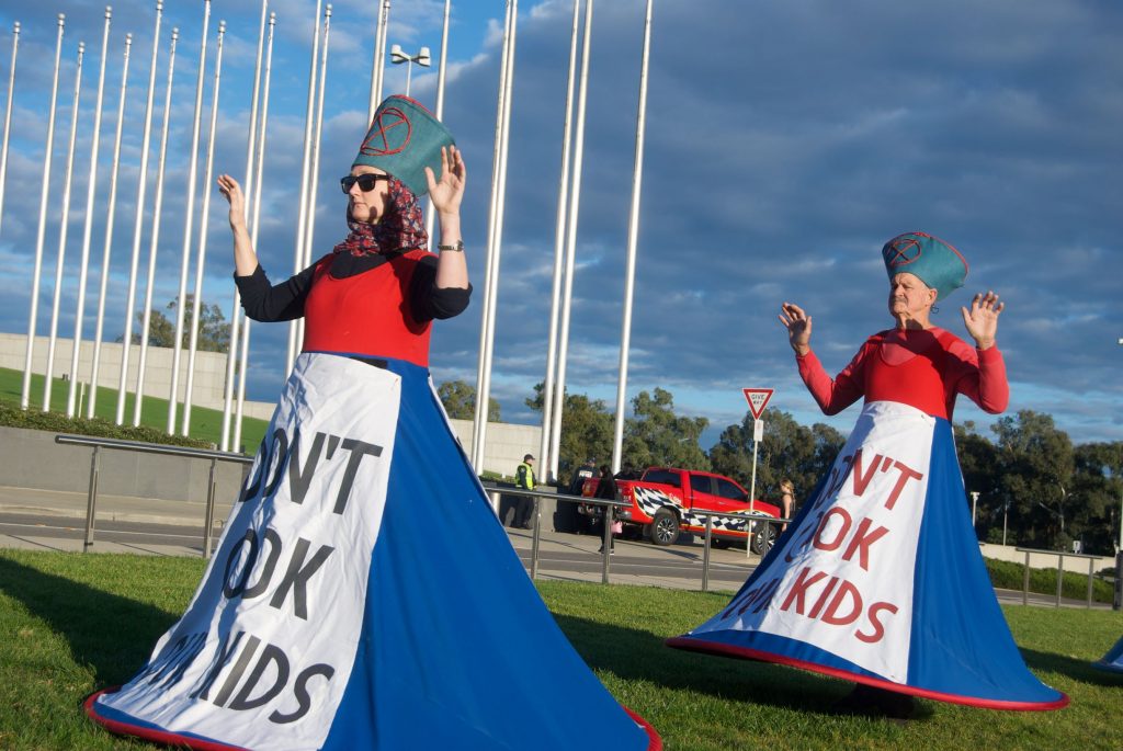 Extinction rebellion protester in Canberra for budget 2021 protest