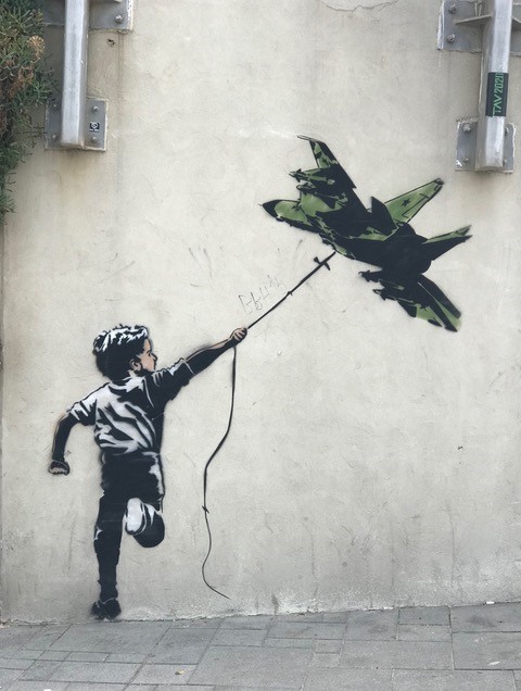 mural in Hebron, Palestine, boy flying kite