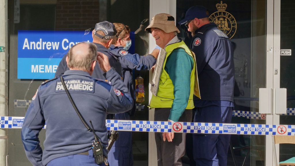 Bega Police un-gluing XR protester Andrew from office door