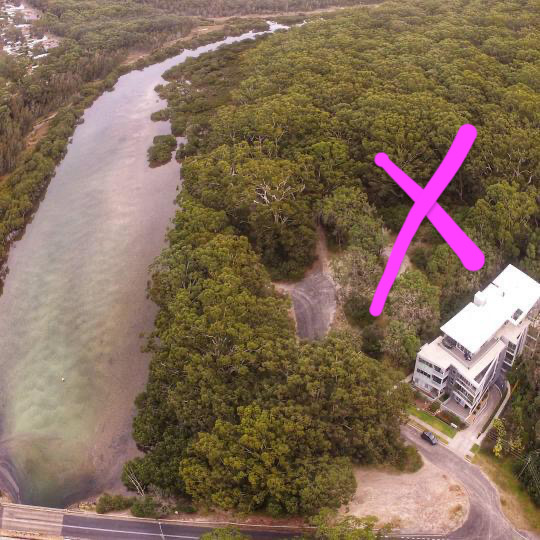 The cross marks the development site at 4 Murdoch Street Huskisson, right next to Moona Moona Creek and behind existing apartment block Aquamist