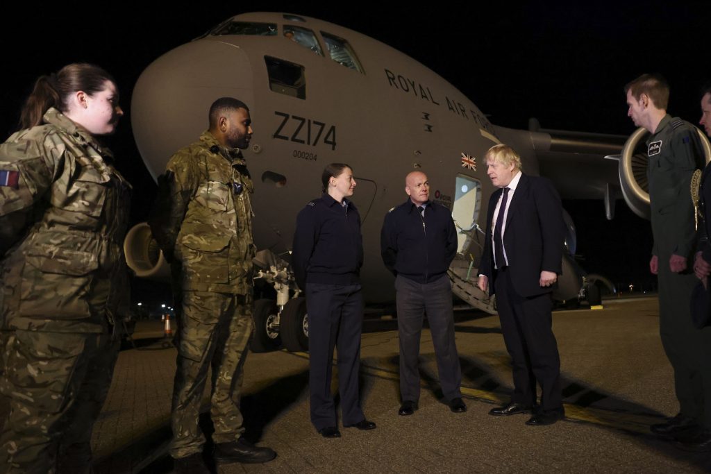 PM Boris Johnson meeting military personnel to thank them for their ongoing work facilitating military support to Ukraine and NATO. London, UK, February 2022.