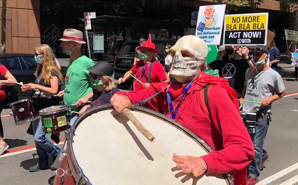 Drummers at Blockade Australia climate protest in Sydney on 27 June 2022