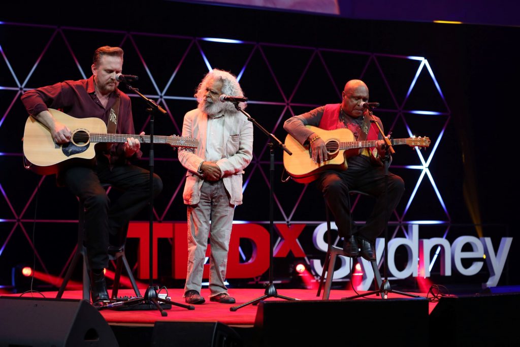 Uncle Jack Charles sings with Archie Roach and Craig Pilkington at the TEDxSydney in June 2017 following his inspiring talk about his life and his work in youth justice.