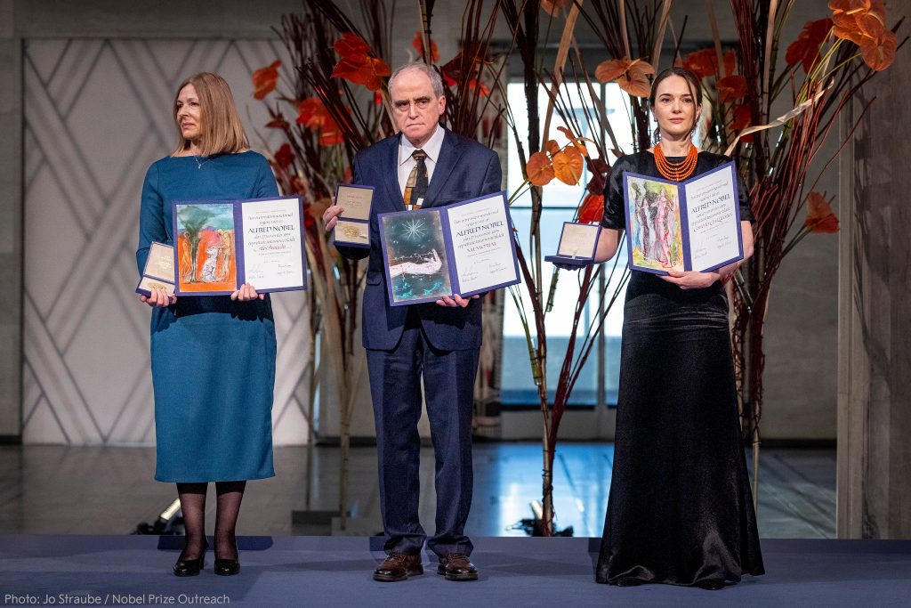 Nobel Peace Prize 2022 recipients holding their awards at the award ceremony. From left: Natalia Pinchuk (on behalf of jailed Belarusian activist Alex Bialiatski), Yan Rachinsky and Oleksandra Matvichuk.